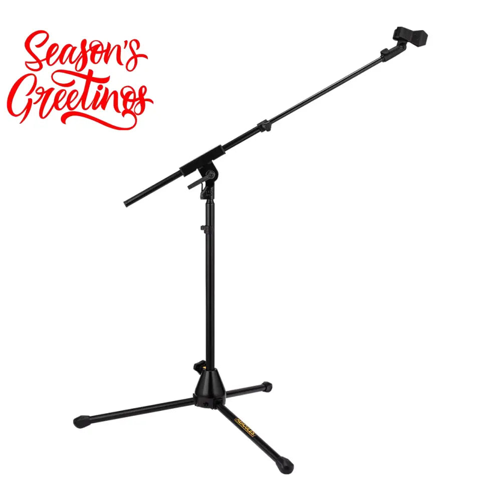 Hercules MS520BPRO Low Profile Tripod Microphone Stand with a telescoping boom arm, featuring a black color scheme and a folding tripod base.