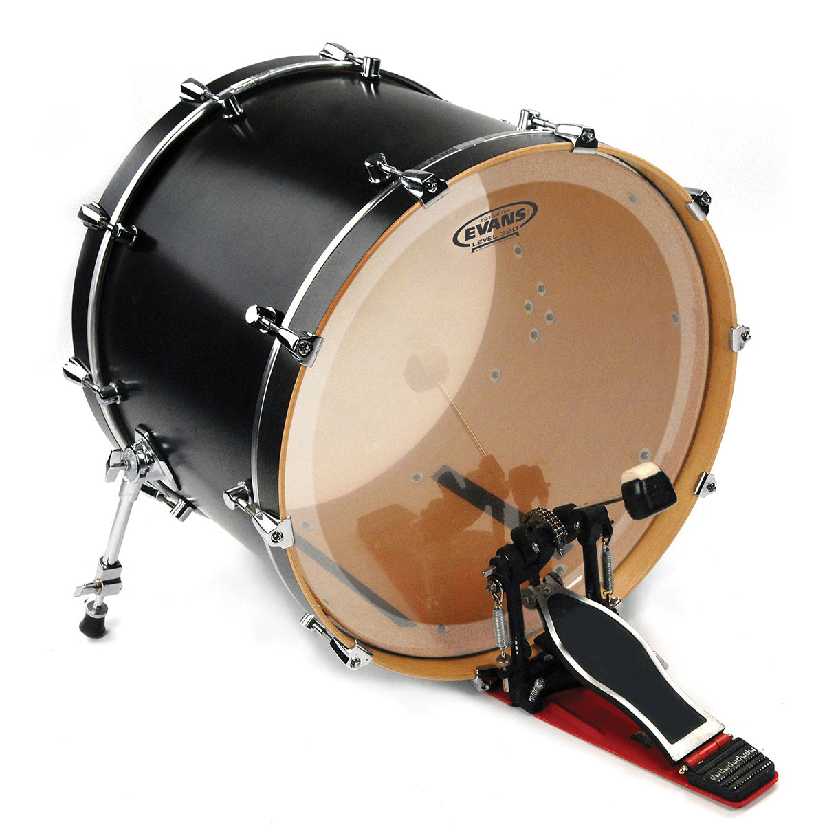 Evans Clear EQ3 drumhead on a bass drum with a pedal, showcasing the transparent center with a tan rim and blackEvans Clear EQ3 drumhead on a bass drum with a pedal, showcasing the transparent center with a tan rim and black.