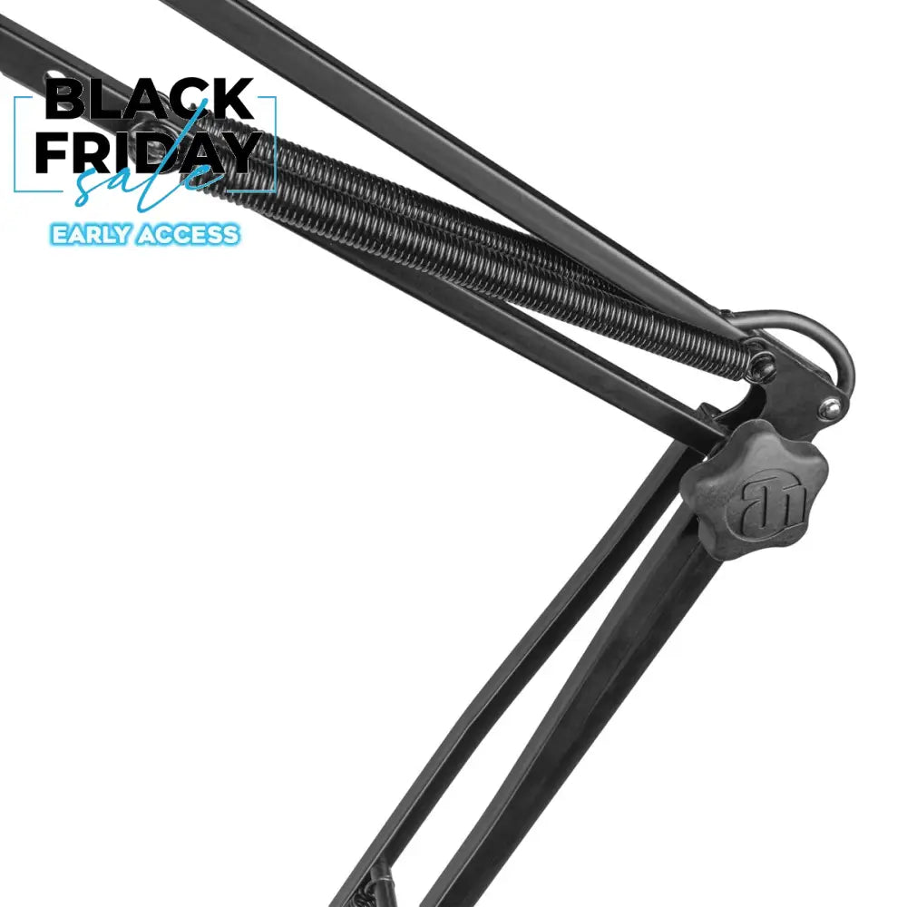 Close-up of a black metal frame with a spring mechanism on a white background